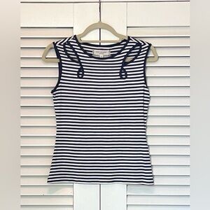 Max Studio top with cut out embellishments. Never worn.